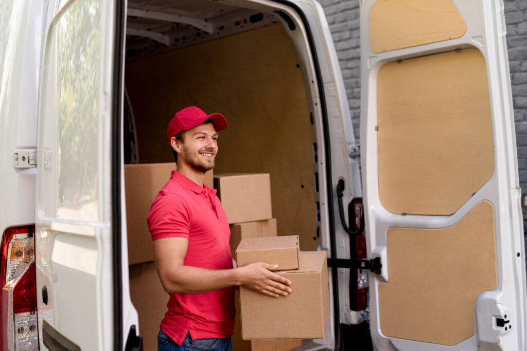 delivery man car carrying packages